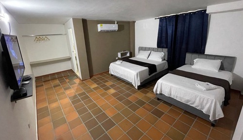 Habitación Confort con 1 cama doble o 2 individuales