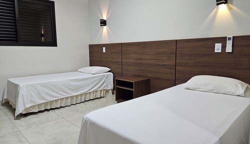 Habitación ejecutiva con 2 camas individuales