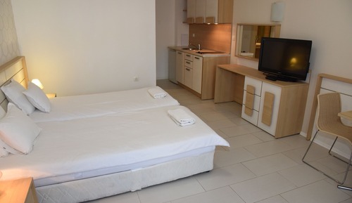 Studio with kitchenette and patio