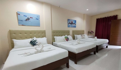 Habitación triple familiar, varias camas
