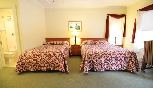 Habitación tradicional, varias camas