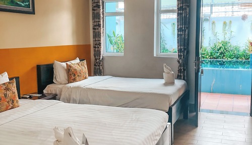 Habitación triple Deluxe