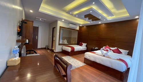 Habitación de lujo, varias camas