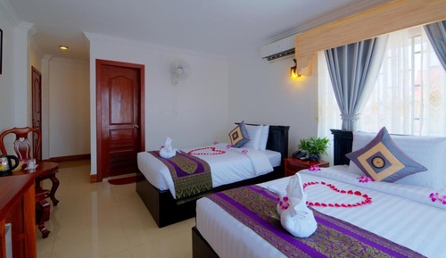 Habitación triple Deluxe