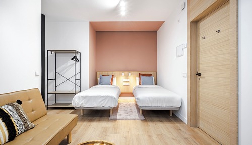 Habitación triple, varias camas