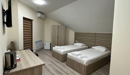 Habitación City con 1 cama doble o 2 individuales, 2 camas individuales
