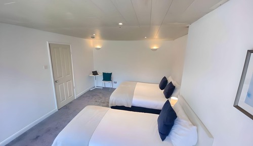 Habitación Grand con 1 cama doble o 2 individuales