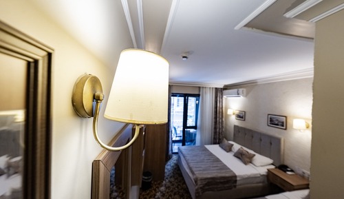 Standard Room - Trp Triple with City View and French Balcony