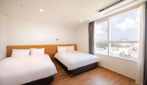 Habitación cuádruple Deluxe, 2 camas dobles