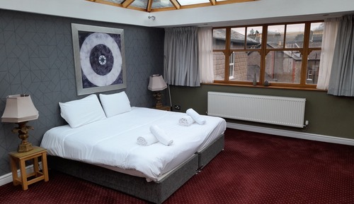 Habitación cuádruple Deluxe