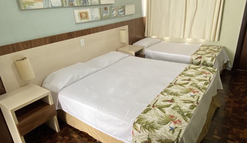 Habitación triple ejecutiva, varias camas