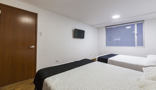 Habitación cuádruple estándar, 2 camas dobles