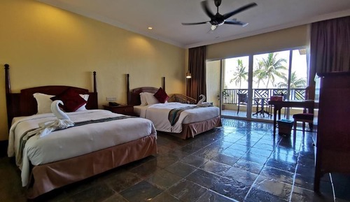 Suite ejecutiva, varias camas, vistas a la playa