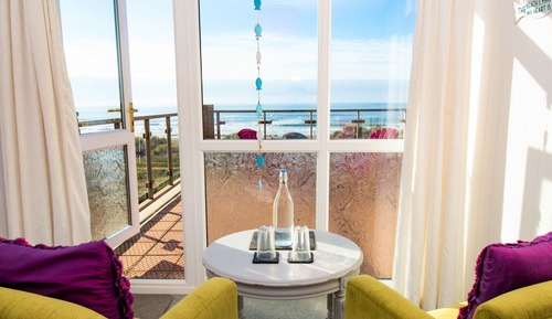 Habitación doble, baño privado (with beach facing balcony)