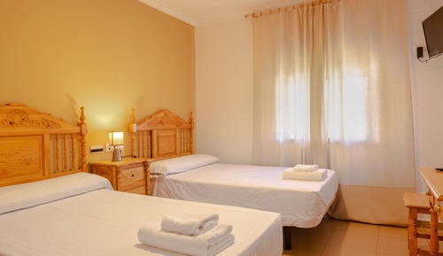 Habitación Confort con 1 cama doble o 2 individuales