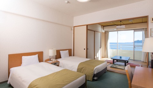 Habitación cuádruple estándar, fumadores, vistas al mar