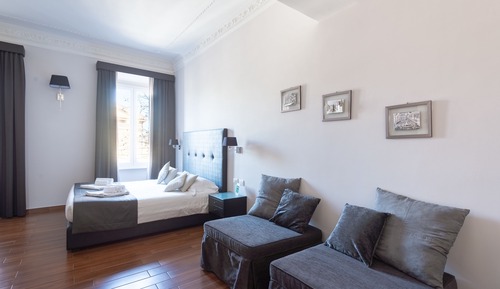 Habitación cuádruple Deluxe, 1 cama de matrimonio grande