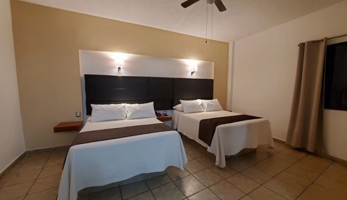 Habitación familiar, varias camas