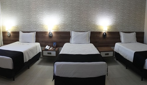 Habitación triple ejecutiva