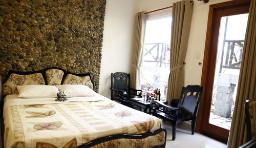 Habitación superior, vistas al jardín