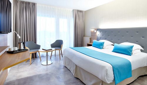 Habitación Club doble, vistas al jardín, planta baja