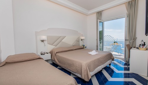 Habitación triple Deluxe, vistas al mar