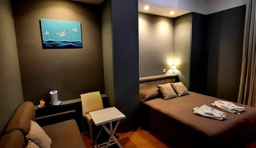 Habitación doble, balcón, vistas parciales al mar