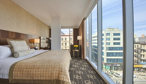 Habitación Deluxe, varias camas, en esquina (Corner Room)