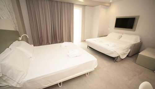 Habitación cuádruple Deluxe