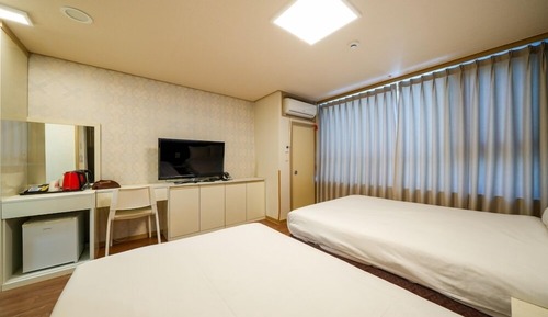 Habitación familiar con 2 camas individuales