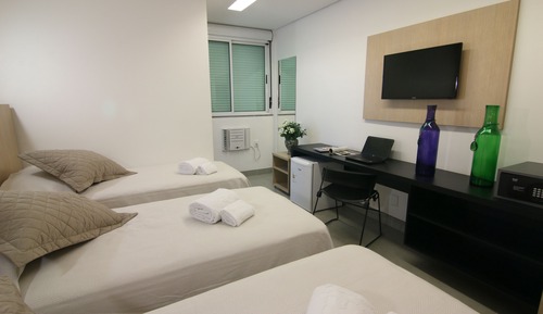 Habitación triple ejecutiva