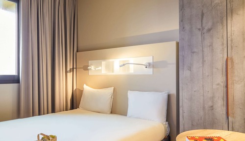 Habitación triple, varias camas