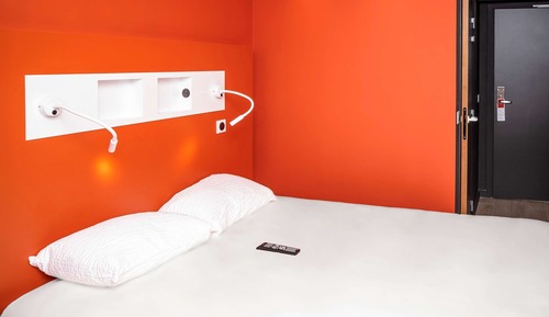 Habitación triple, varias camas