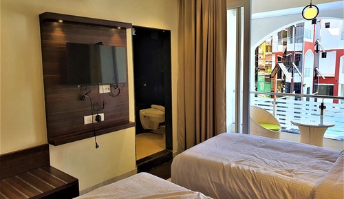 Deluxe Pool View Room, with Balcony