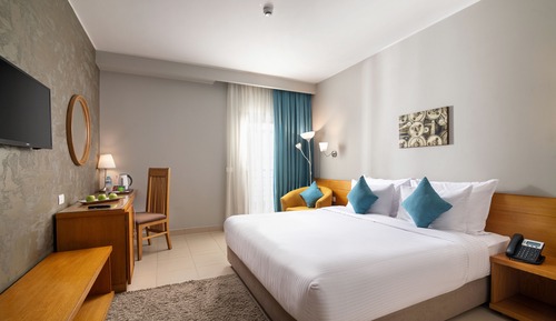 Habitación Deluxe, 1 cama de matrimonio grande, vistas a la piscina