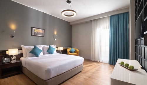 Suite Deluxe, 1 cama de matrimonio grande, vistas a la ciudad