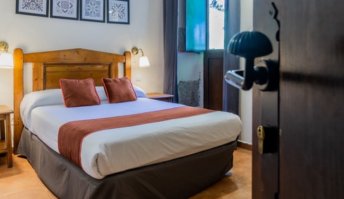 Habitación superior con 1 cama doble o 2 individuales
