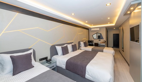 Habitación cuádruple Deluxe