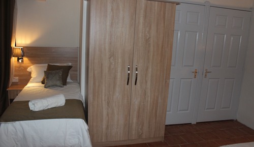 Habitación Deluxe, varias camas, vistas al jardín