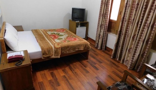 Habitación estándar con 1 cama doble o 2 individuales