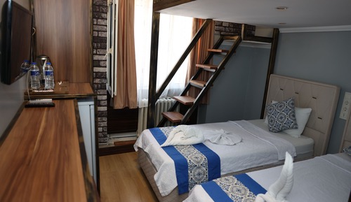 Habitación triple Deluxe