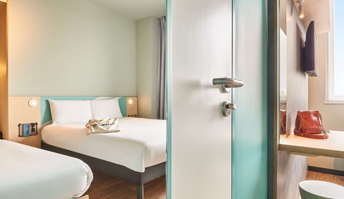 Habitación triple, varias camas