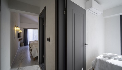 Suite familiar, 2 habitaciones, vistas parciales al mar