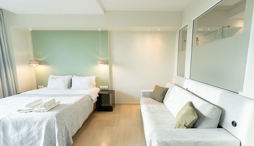 Suite estudio Deluxe, 1 cama de matrimonio con sofá cama, bañera de hidromasaje, vistas al mar