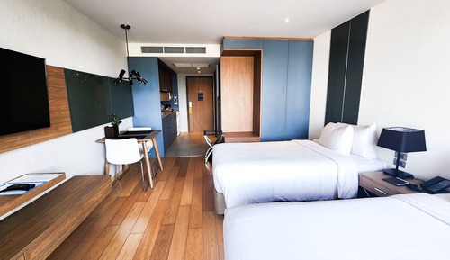 Estudio ejecutivo, 2 camas individuales, cocina básica