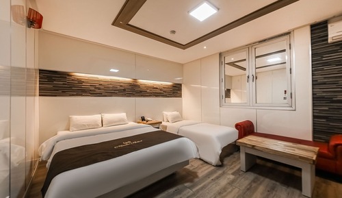 Room (Deluxe twin (double + single/styler e)