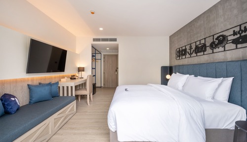 Habitación Deluxe doble, acceso a la piscina