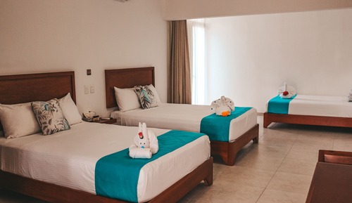 Suite estudio Deluxe, varias camas, baño privado