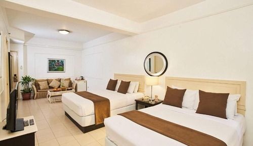 Habitación superior, varias camas