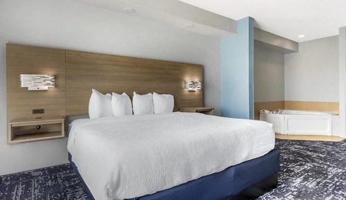 Suite, 1 cama de matrimonio grande, no fumadores, bañera de hidromasaje (with Sofabed)
